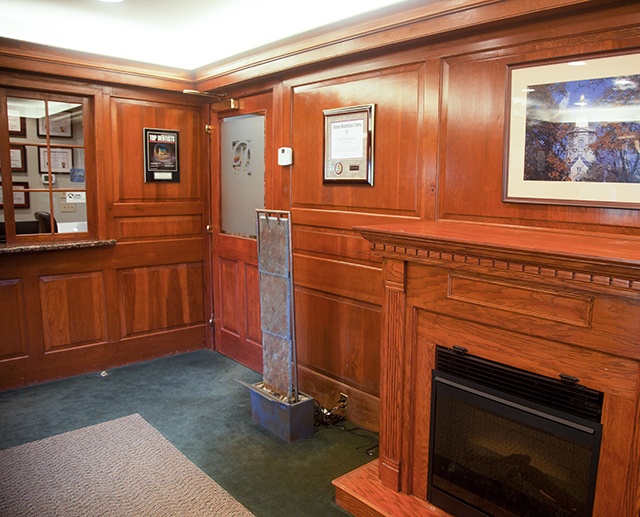 Dental office waiting area with fireplace