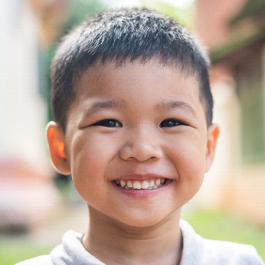 A little boy showing off his healthy smile after having a lip and tongue-tie released in Phillipsburg