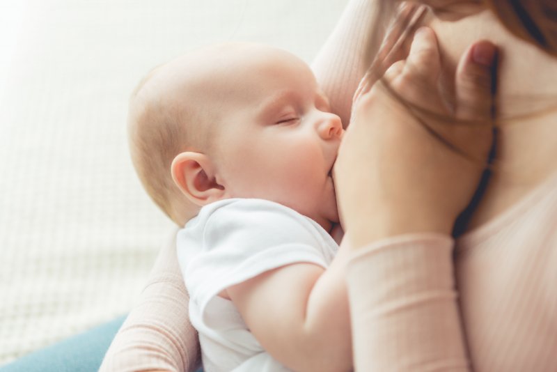 closeup of baby breastfeeding